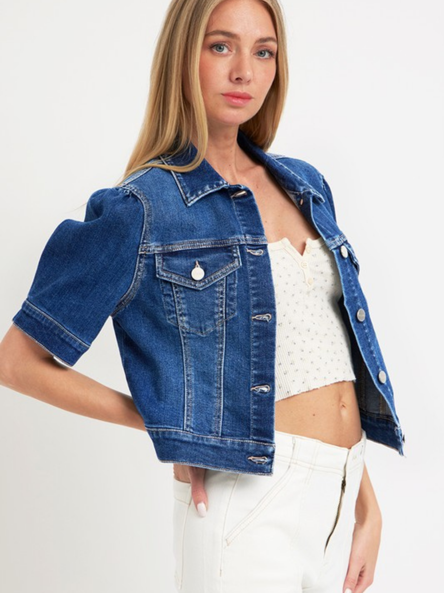 Mimi & Rae puff sleeve cropped jacket in neutral fabric, featuring a stylish, fitted design with puffed sleeves and a cropped length.
