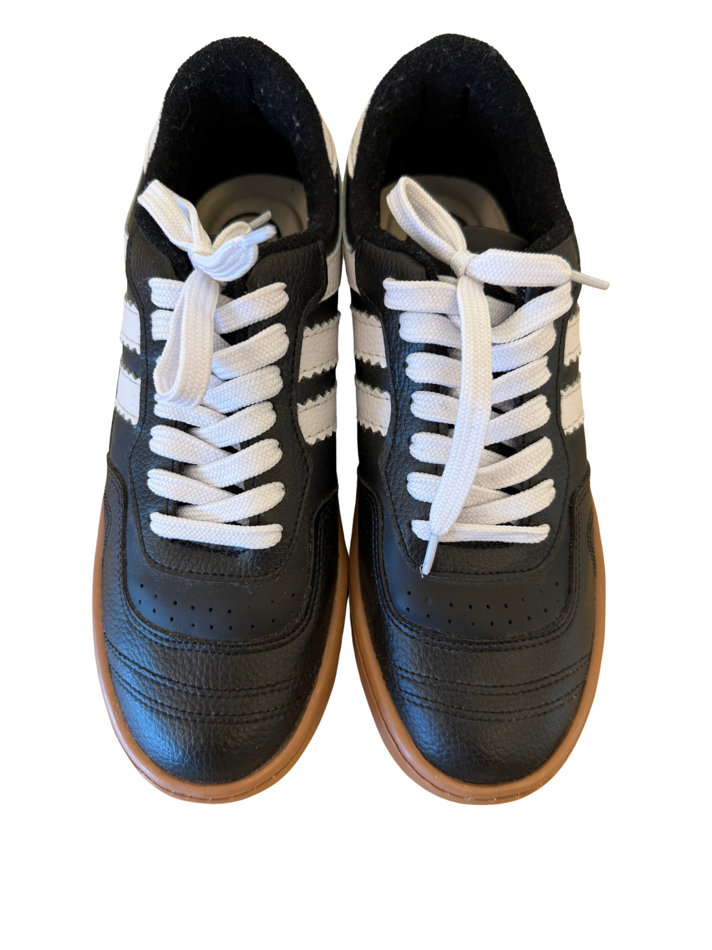 Pair of Mimi & Rae Two Stripe Sneakers showing black and white striped design and casual sneaker style.