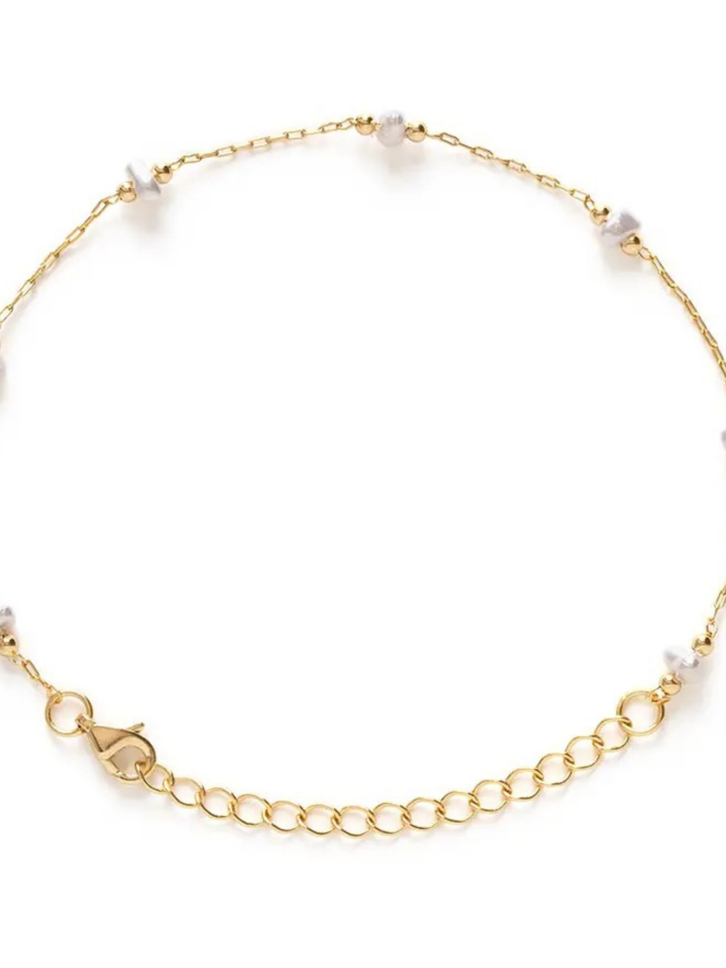 Elegant pearl bracelet by Amano Studios featuring white pearls on a delicate jewelry chain.