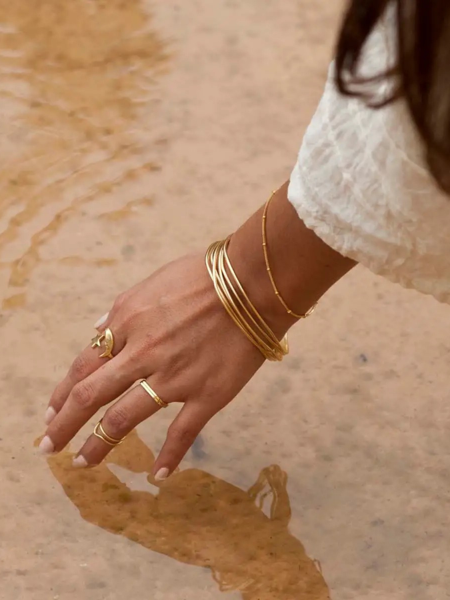 Sage-colored ring from Mimi & Rae, showcasing a stylish and elegant accessory with a smooth band and subtle finish.