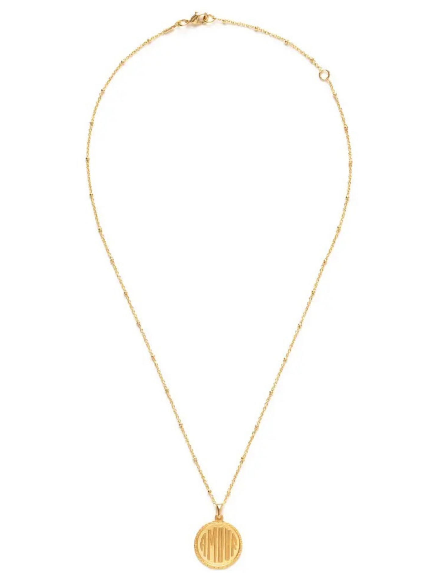 Amano Studios love necklace with a delicate heart pendant on a fine chain, displayed against a neutral background.