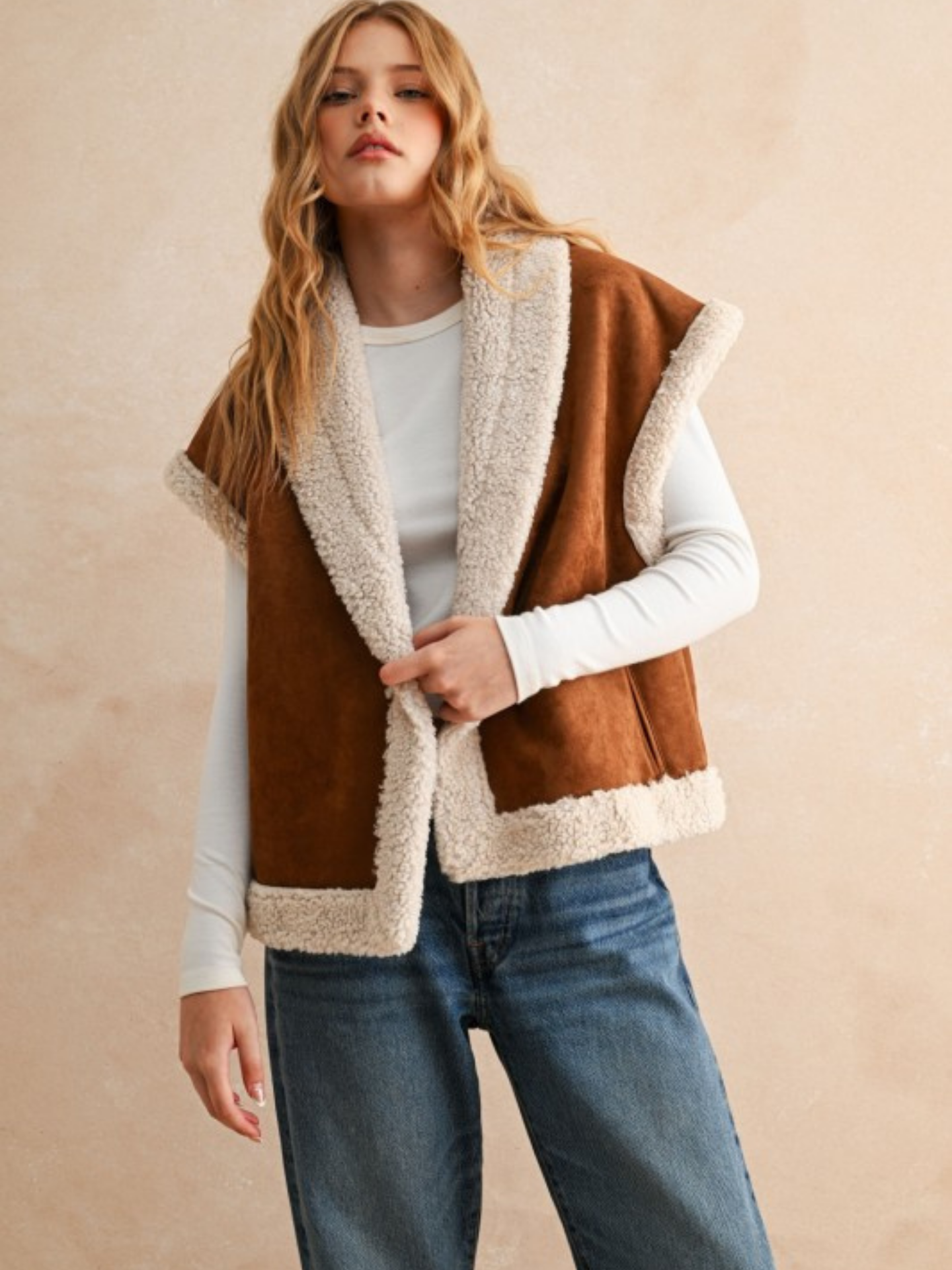 Miou Muse Faux Sherpa Contrast Vest featuring a soft sherpa fabric and stylish color contrast, perfect for layered winter outfits.