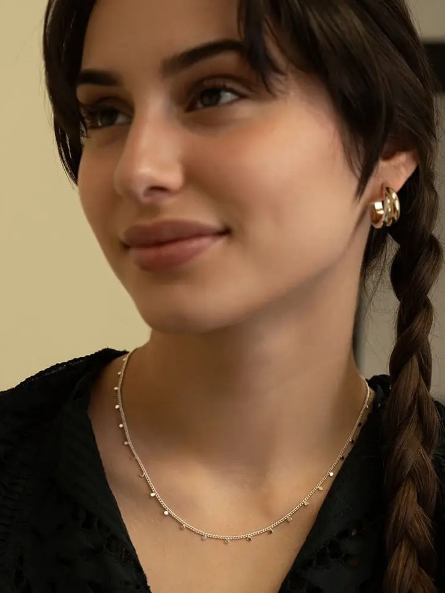 Amano Studios dot necklace featuring a delicate chain with small, evenly spaced dot pendant on a white background.