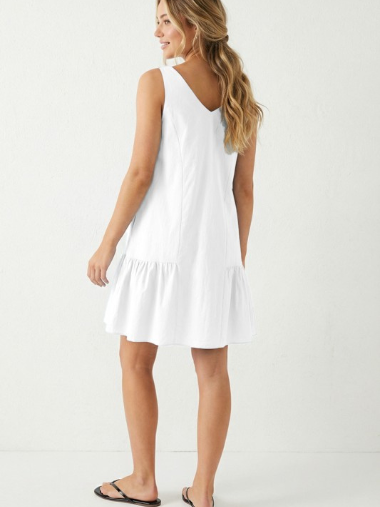 Naked Zebra ruffle mini dress featuring a flowy silhouette and ruffled details, ideal for casual or summer wear.