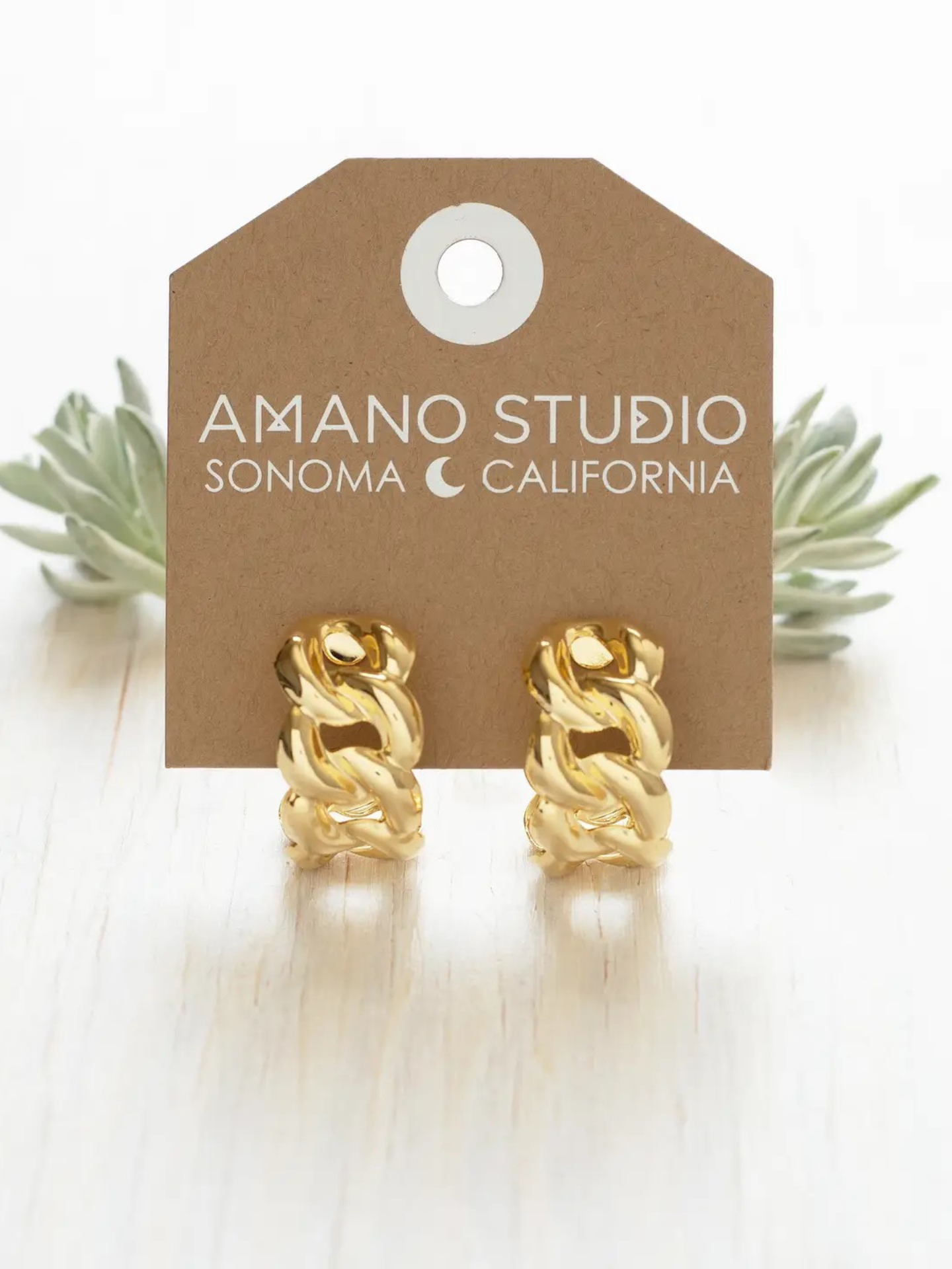 Amano Studios Magnolia earrings featuring delicate floral design in gold tone, stylish accessories for women.