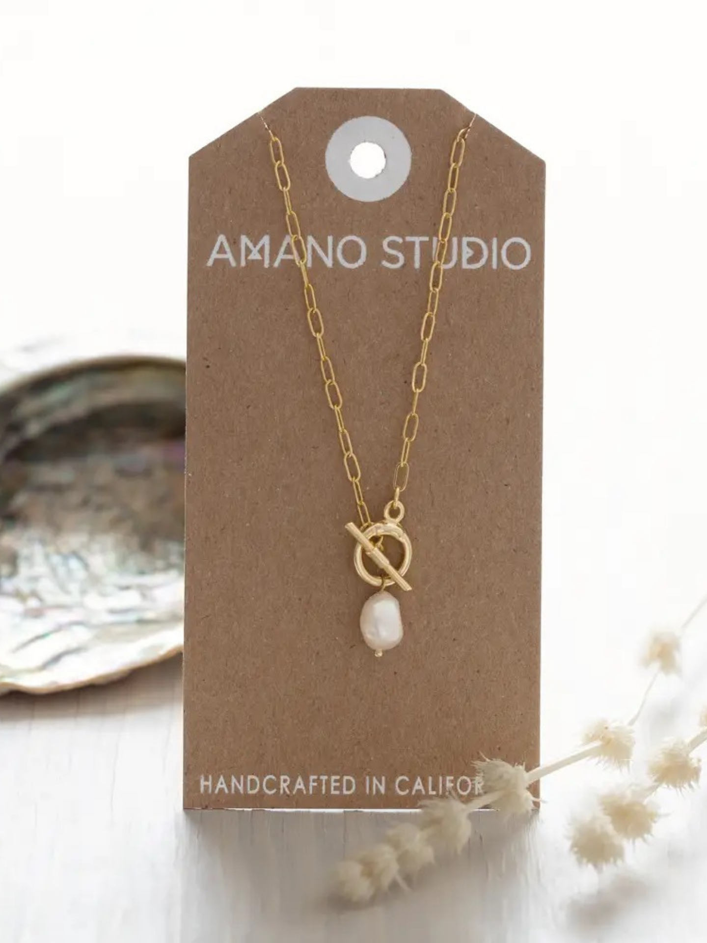 Amano Studios Dahlia Necklace featuring a delicate floral pendant on a fine chain, ideal for stylish accessories.