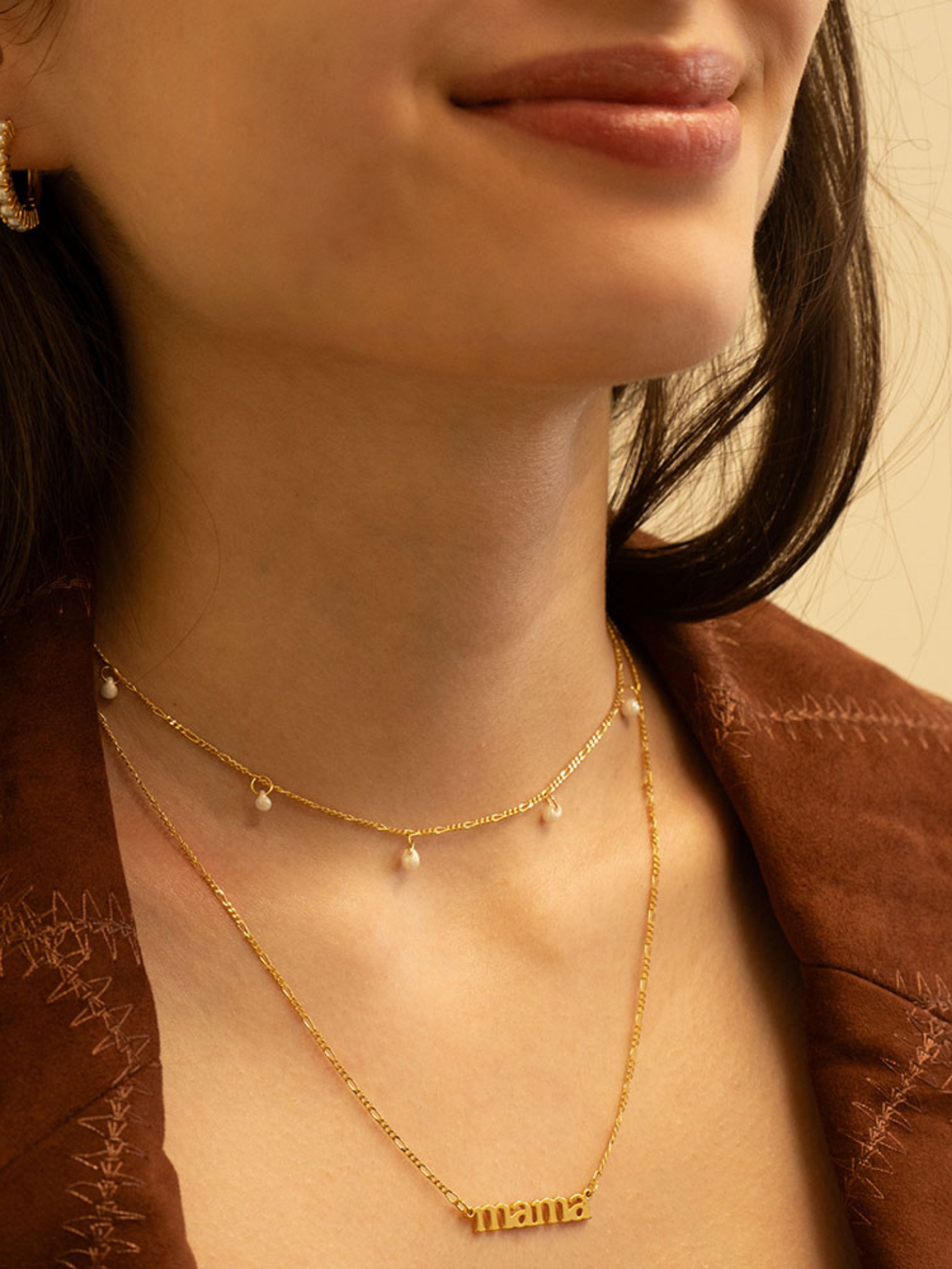 Amano Studios Mama Necklace featuring a delicate pendant on a fine chain, perfect for stylish maternity or everyday wear.