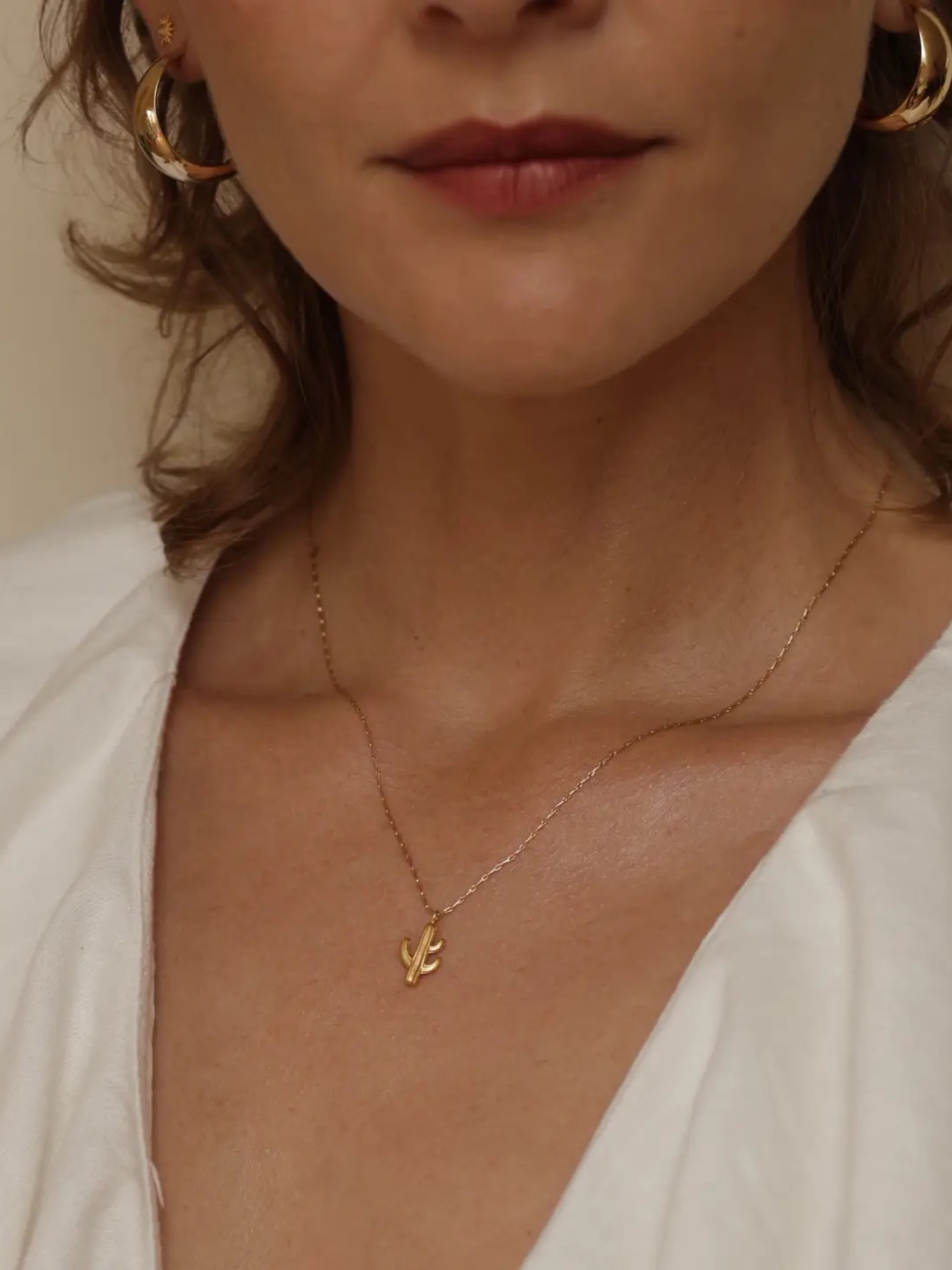 Amano Studios Saguaro Necklace featuring a desert cactus pendant on a delicate chain, perfect for boho and southwestern style accessories.
