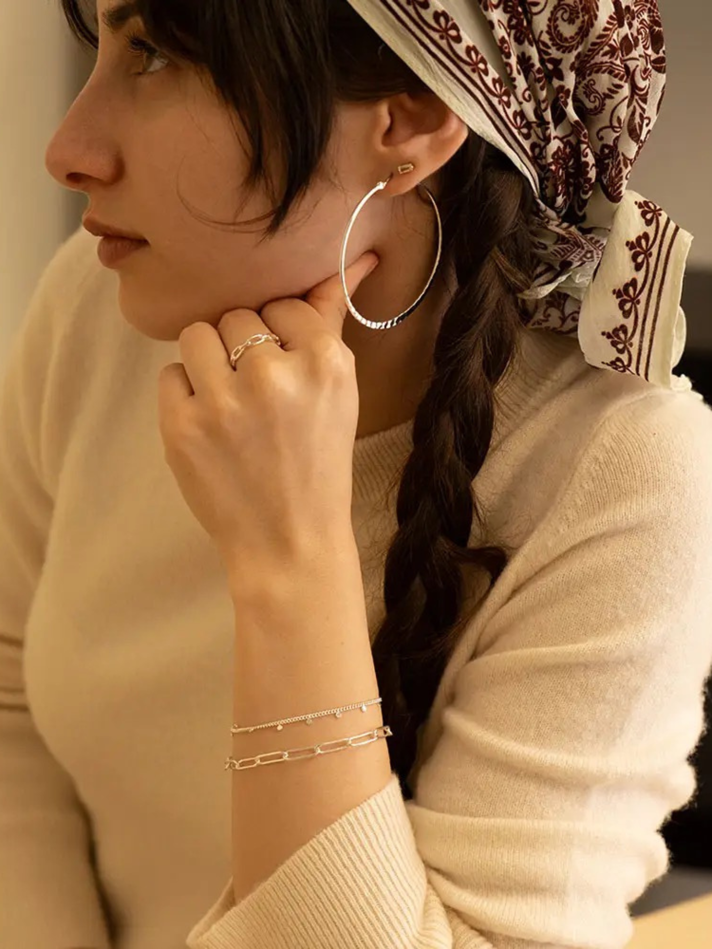 Amano Studios dot bracelet featuring a series of colorful, round beads strung together on a delicate jewelry chain.