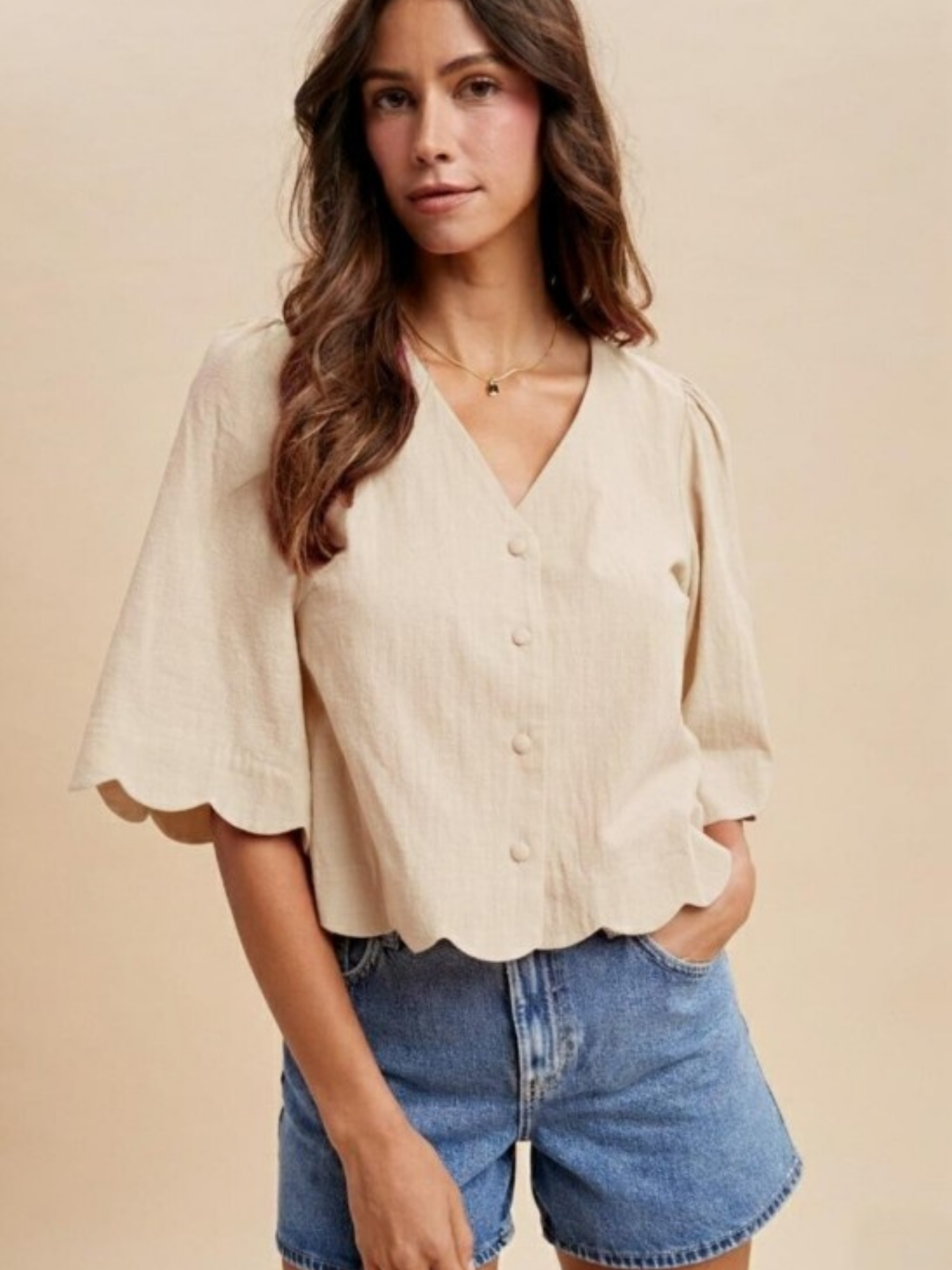 Mimi & Rae scallop hem button-down blouse in soft fabric, featuring a stylish scalloped edge and classic button front.