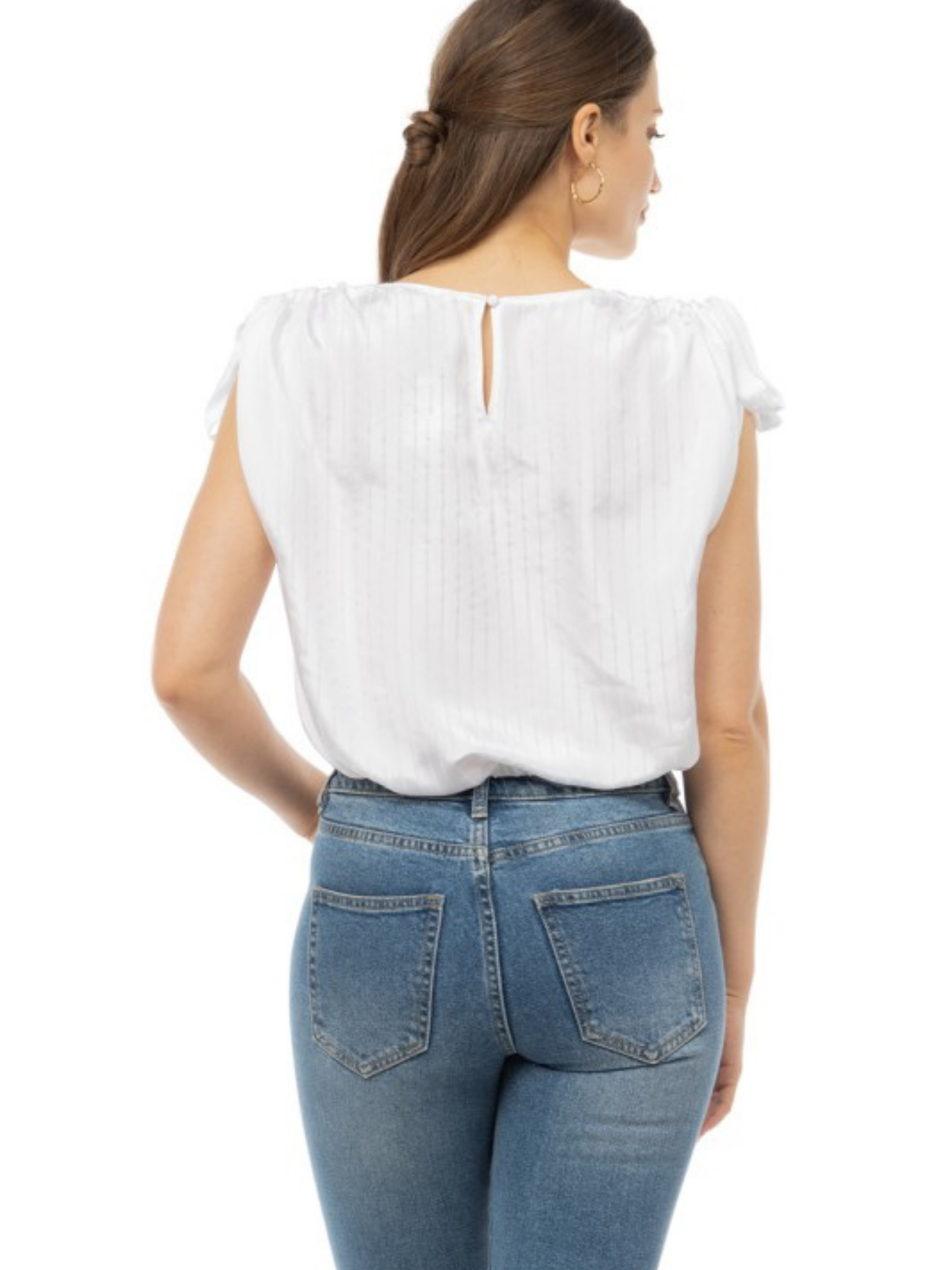 White striped tie sleeve blouse by Mimi & Rae with a relaxed fit and stylish tie details on the sleeves.