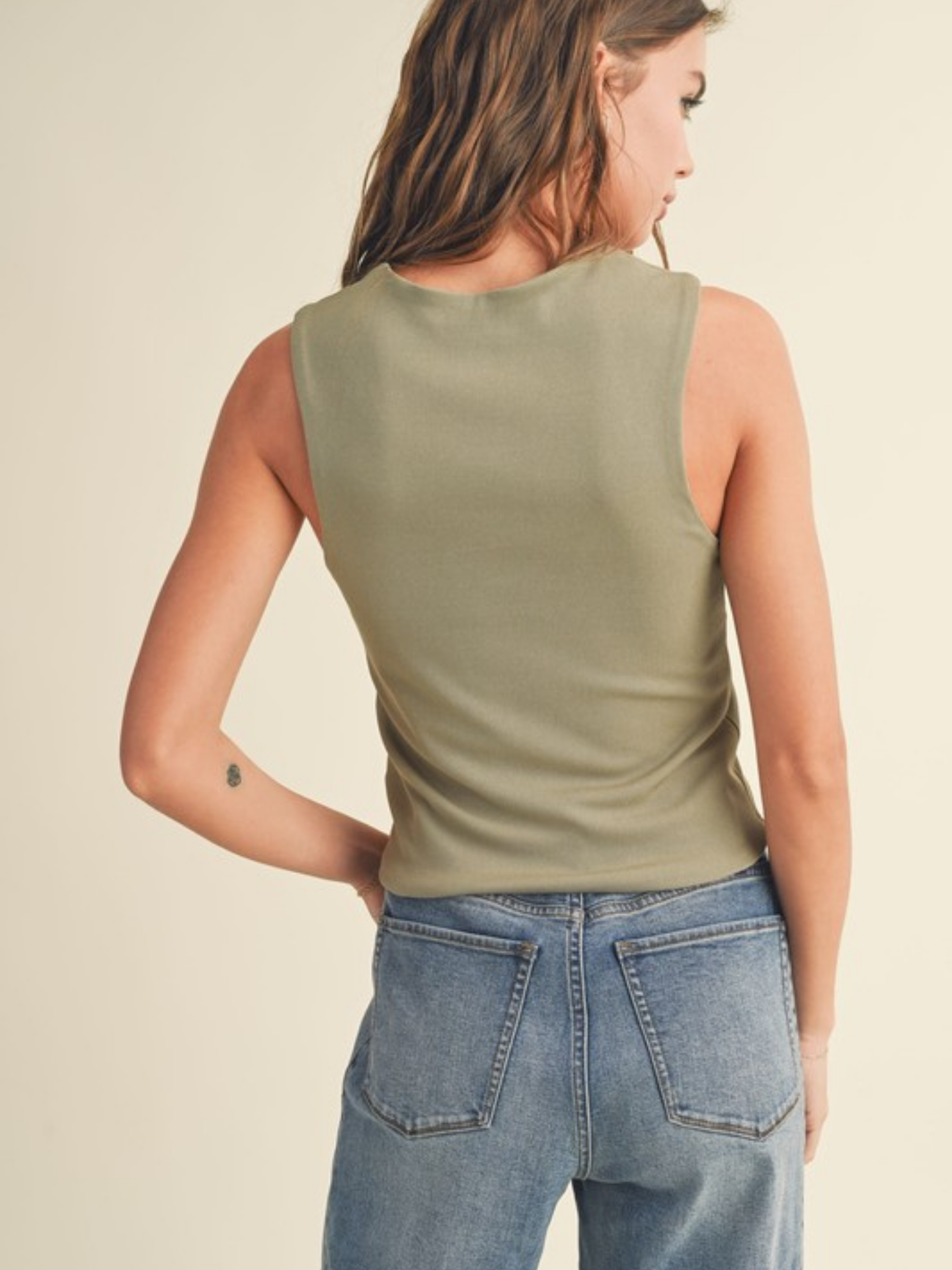 Green textured square neck tank top by Miou Muse, stylish sleeveless apparel with a modern square neckline.