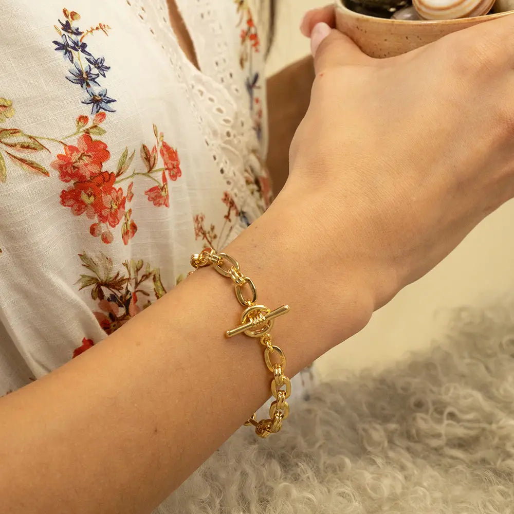 Amano Studios Jasmine bracelet with delicate floral design, featuring intricate metalwork and small jasmine flower charms.