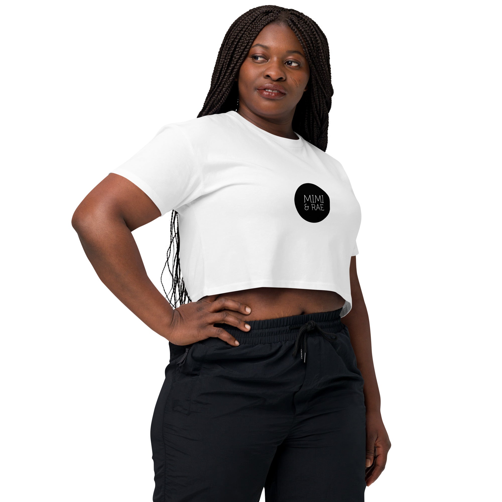White women's crop top T-shirt by Mimi & Rae with logo design, shown from the front right angle.
